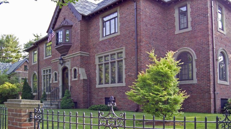 Traditional Colonial American brick home