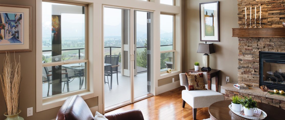 Living room looking towards double doors with Phantom Screens