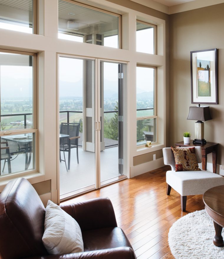 Living room looking towards double doors with Phantom Screens