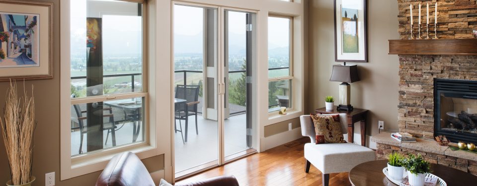 Living room looking towards double doors with Phantom Screens