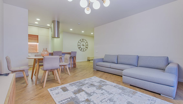 Completed basement with pull out couch and small dining table