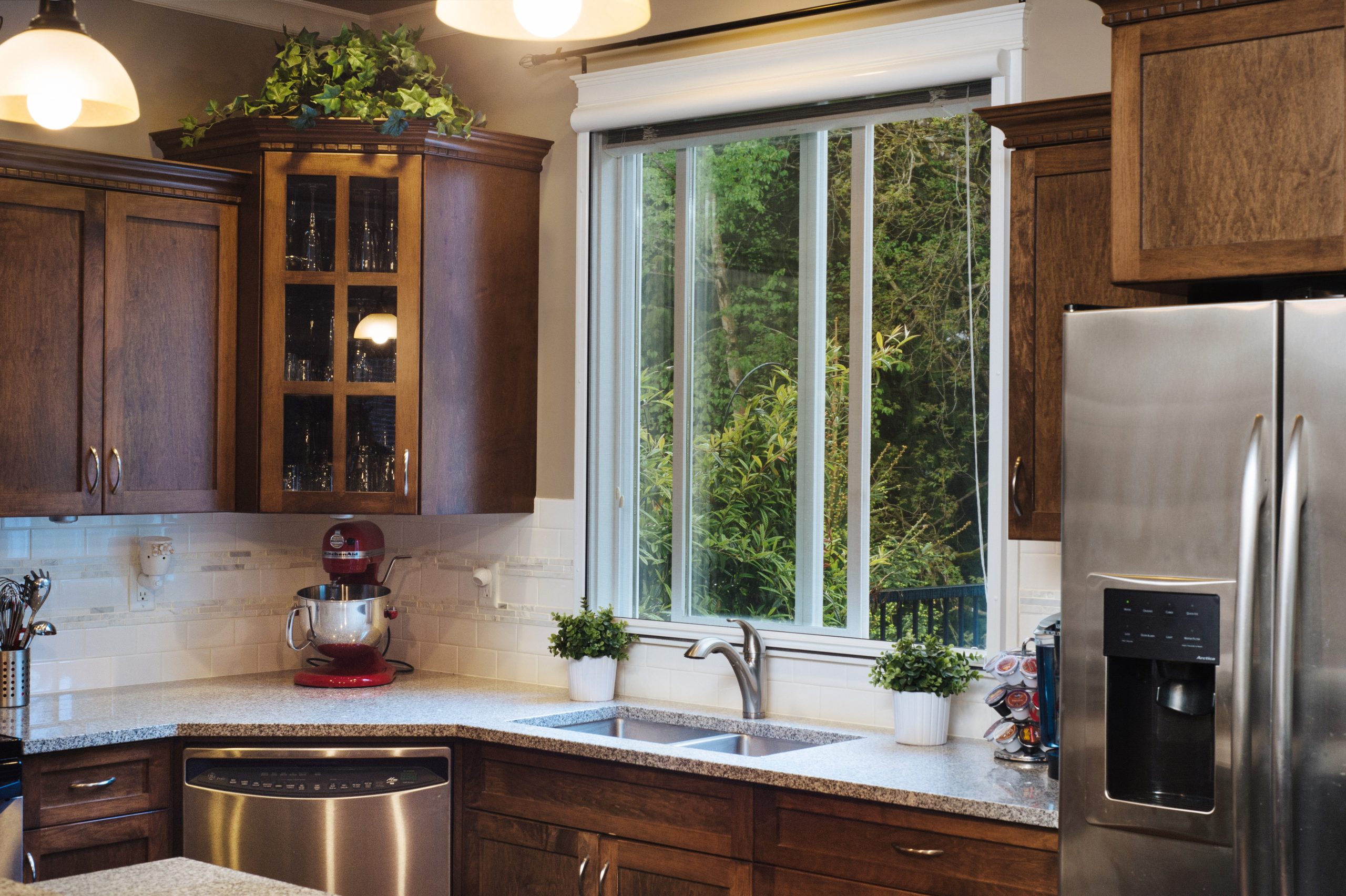 Family home kitchen with retractable window screens