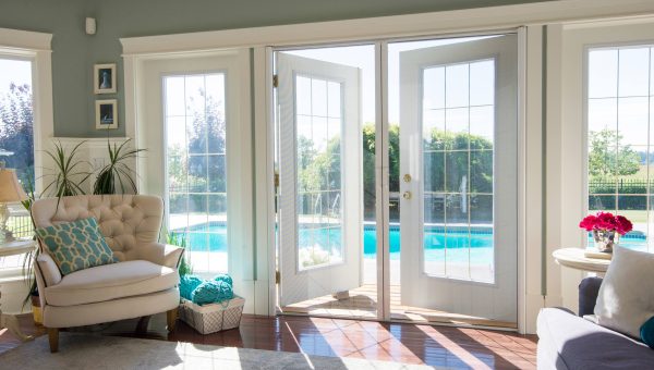 Looking out on to a pool through Phantom retractable screens