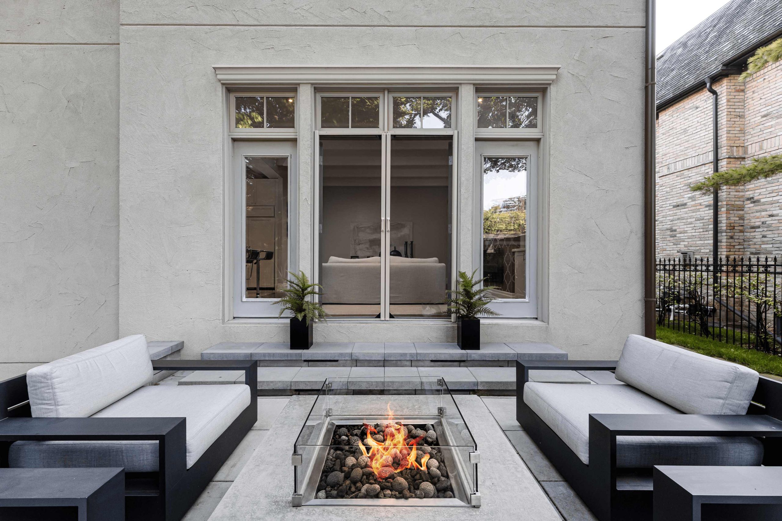 Outdoor Patio area with Phantom Screens Retractable screen doors leading inside