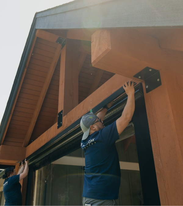 Phantom Screens distributor installing patio screen